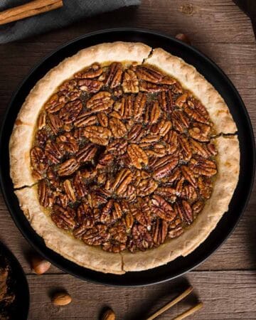smoked pecan pie with wooden backround